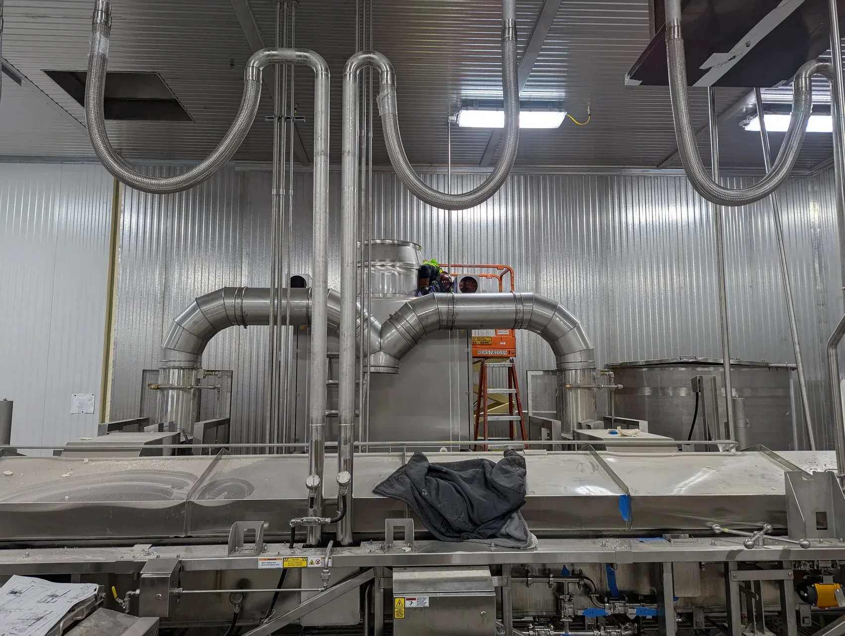 TIG-welded stainless exhaust ductwork and fryer install at a cold-storage food plant by Sons of Thunder Welding