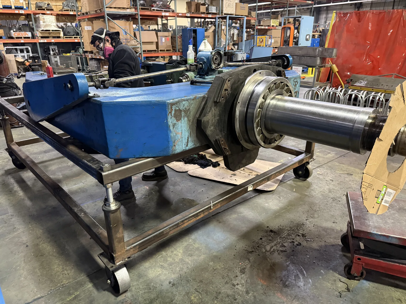 Tall stainless steel plant processing unit and exhaust ductwork serviced by Sons of Thunder Welding